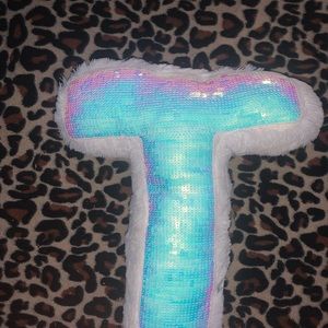 Justice letter T sequin iridescent pillow